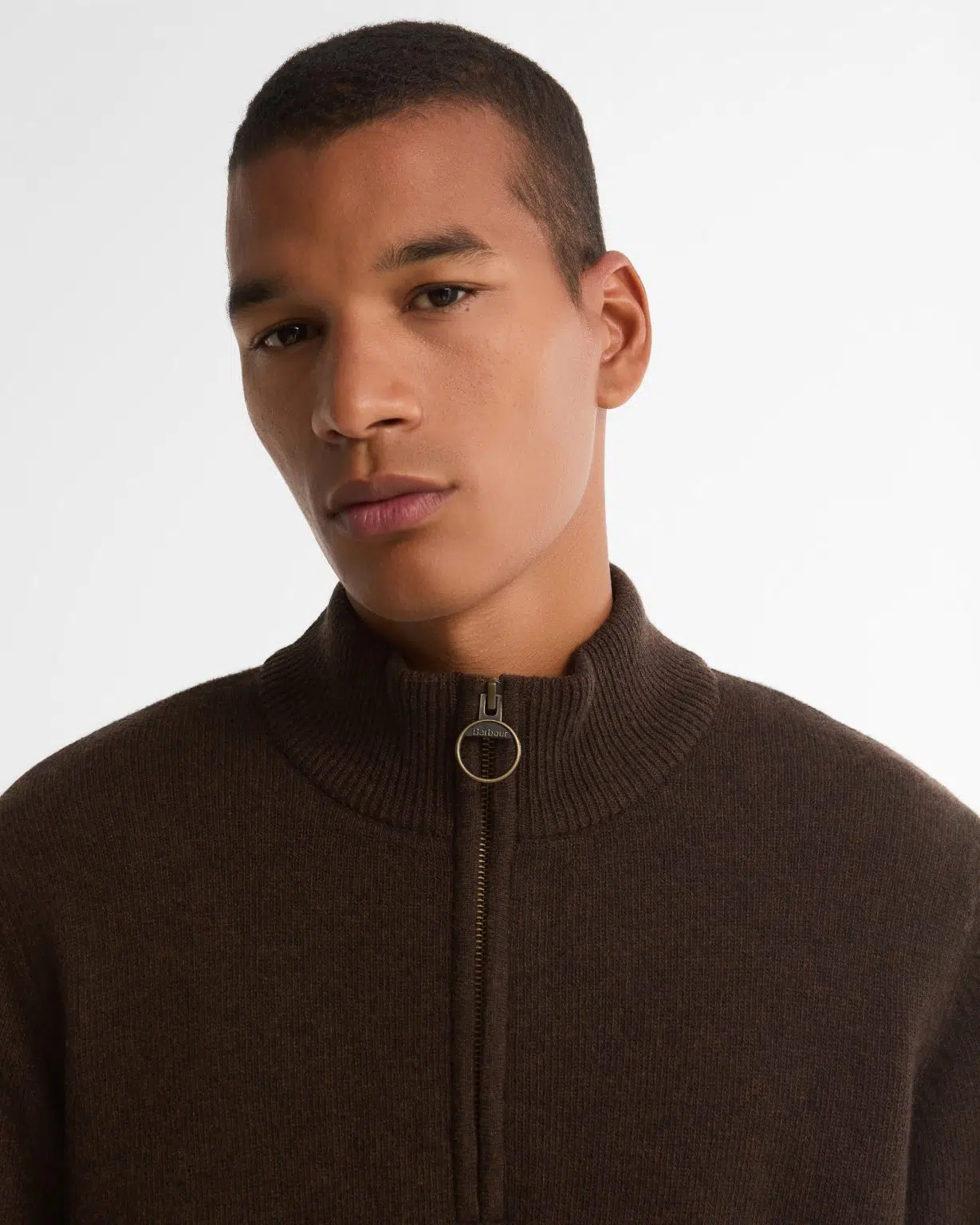 Pull Barbour Holden pour homme en laine, avec col zippé et détails tartan aux coudes et au col.