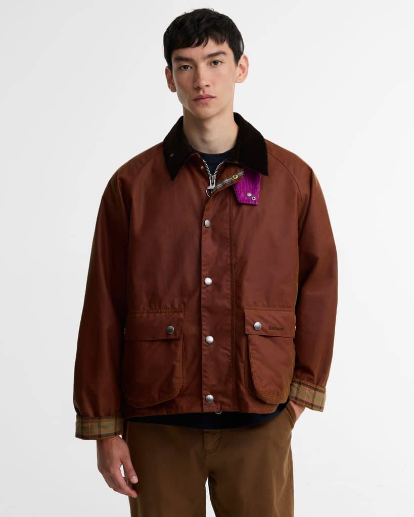 Veste huilée Key Transport Barbour x Paul Smith en coton ciré avec col en velours côtelé et détails colorés.