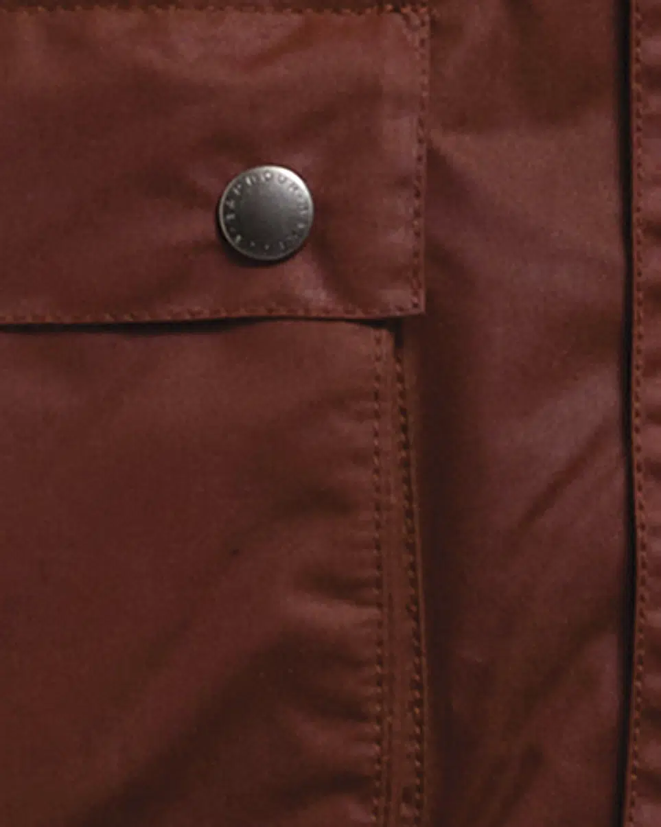Veste huilée Key Transport Barbour x Paul Smith en coton ciré avec col en velours côtelé et détails colorés.