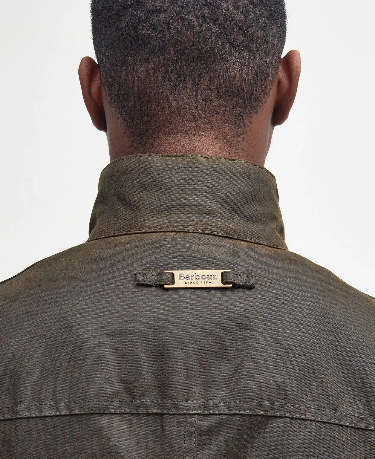 Veste Barbour Ogston pour homme en coton huilé avec gilet matelassé intégré, col en velours côtelé et poches avant.