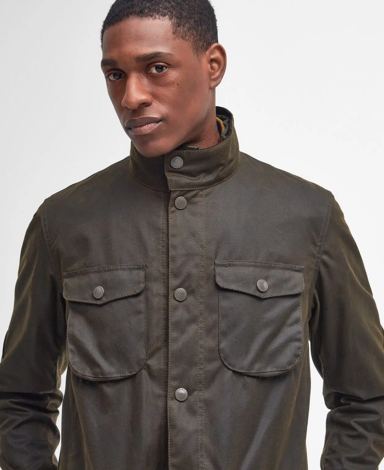 Veste Barbour Ogston pour homme en coton huilé avec gilet matelassé intégré, col en velours côtelé et poches avant.